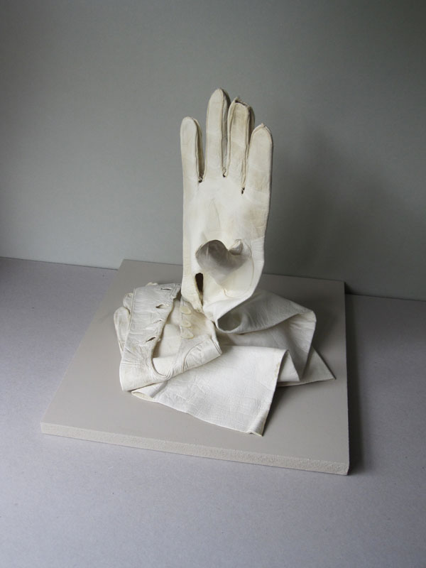 New relics for Reading: Feminist Gloves A pair of cream gloves